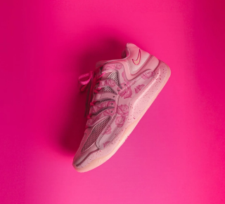 Kevin Durant's Nike KD 18 in a pink "Aunt Pearl" color scheme, as shot by Riccardo Mestre.