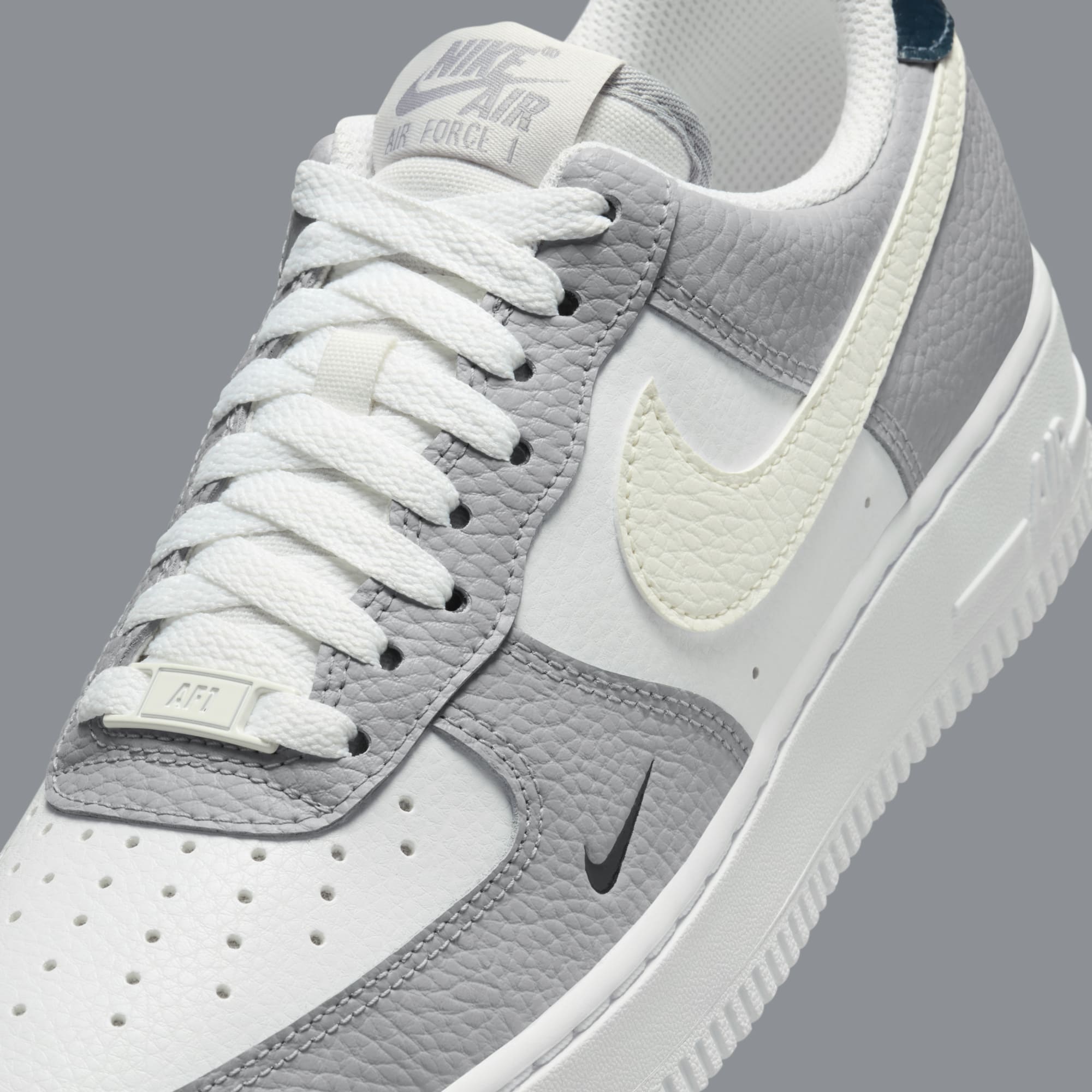 The Nike Air Force 1 Appears With A Navy Mini Swoosh | House of Heat°