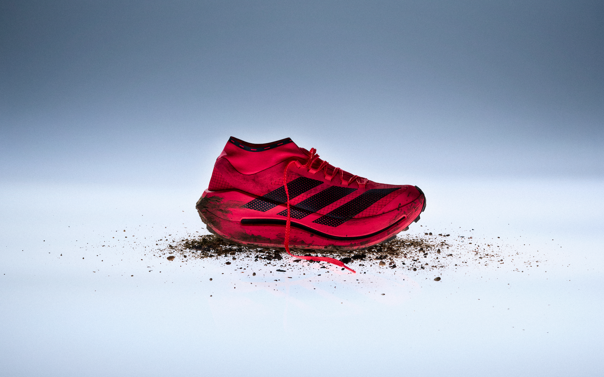 adidas Terrex Agravic Speed Ultra Evo trail racing shoe in a vibrant flash crimson color.