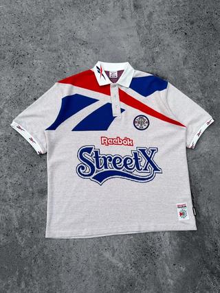 StreetX x Reebok Polo. Photo via StreetX.