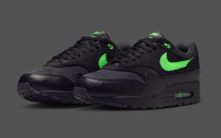 Nike's Air Max 1 in a "Black/Green Strike" color scheme.