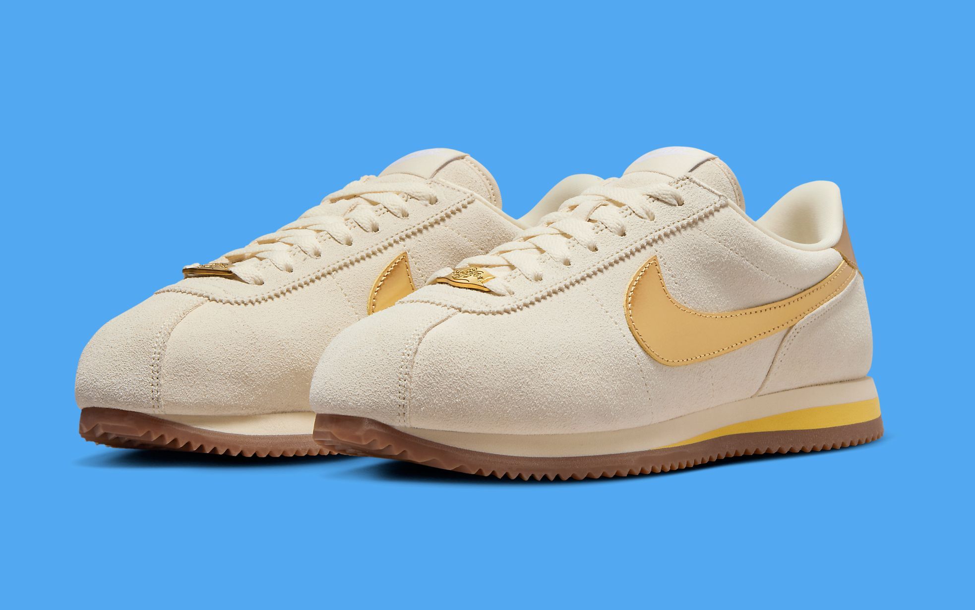 gold nike cortez