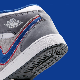 Big Kids's Space Jam x Air Jordan 1 Mid "Hare" (SKU: IZ4720-001). Photo via Nike.