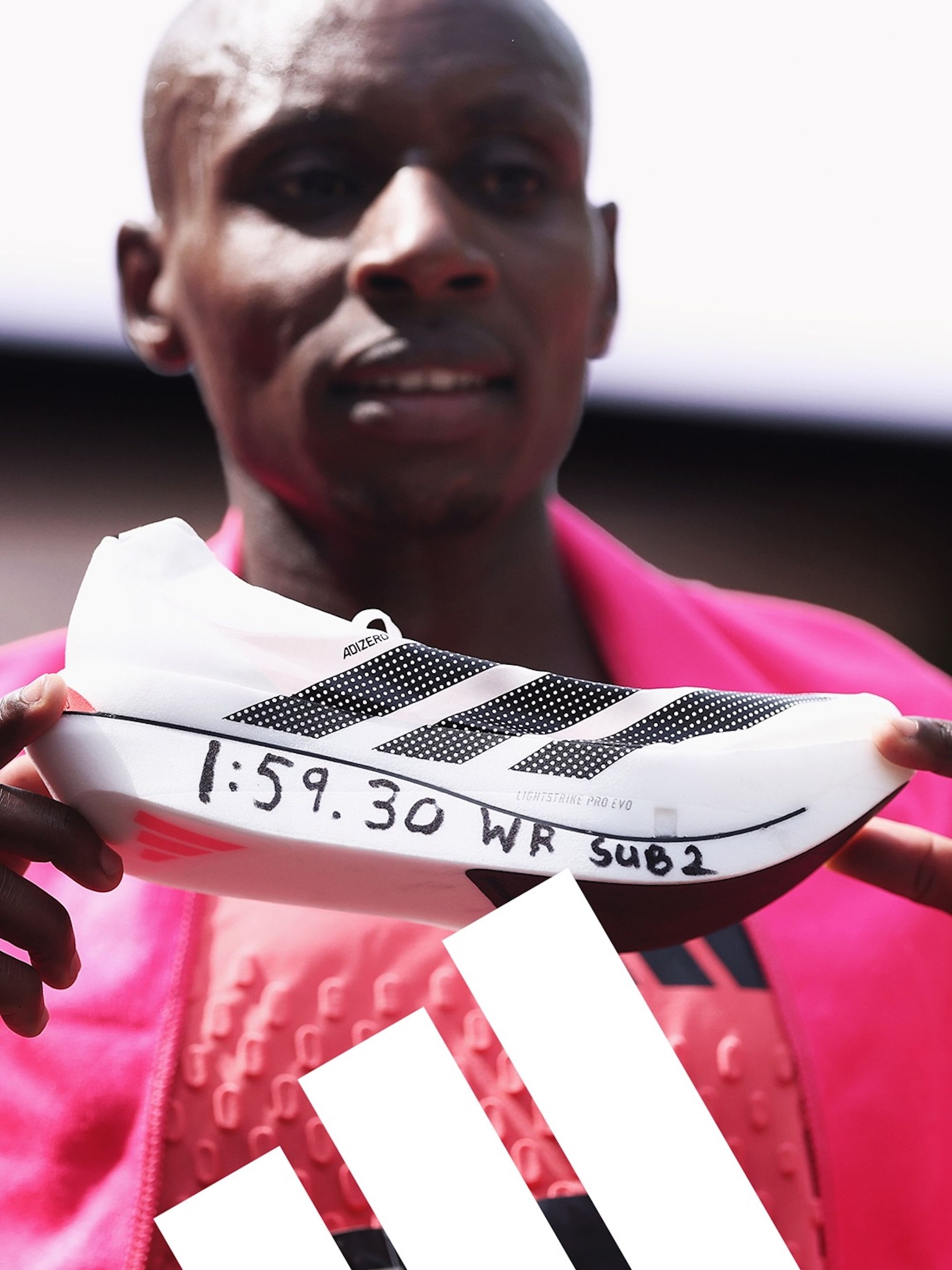 Sabastian Sawę holding the adidas Adizero Adios Pro 3 at the 2026 London Marathon. Photo via adidas.