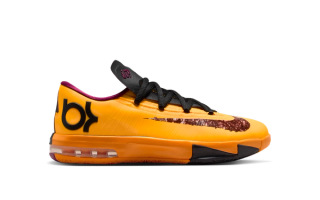 Big Kids' Nike KD 6 "Peanut Butter & Jelly" (2026) in a "Laser Orange/Raspberry Red/Black" color scheme.