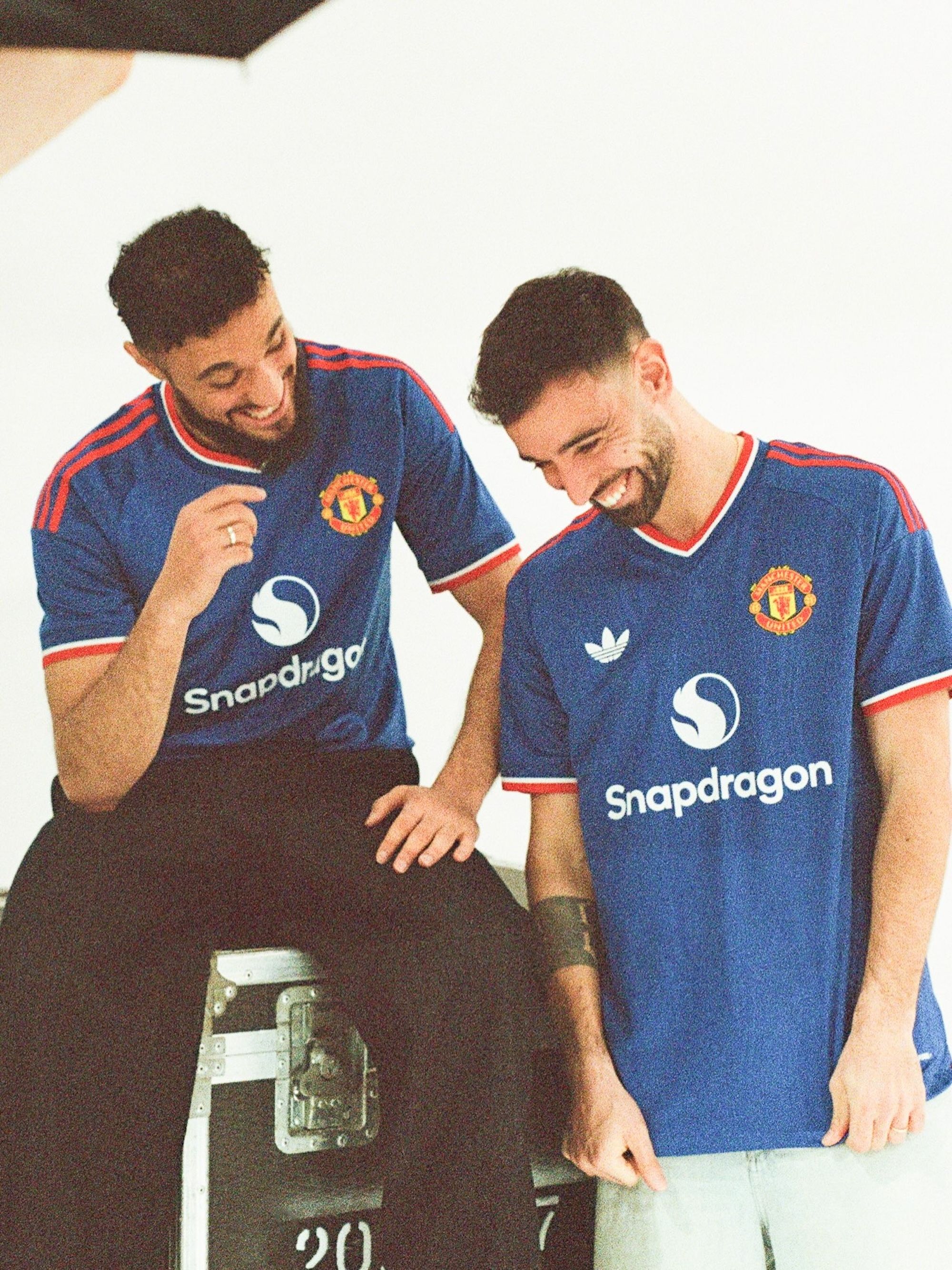 Noussair Mazraoui & Bruno Fernandes for Manchester United 26/27 Away kit by adidas. Photo via Manchester United.