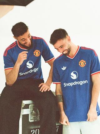 Noussair Mazraoui & Bruno Fernandes for Manchester United 26/27 Away kit by adidas. Photo via Manchester United.