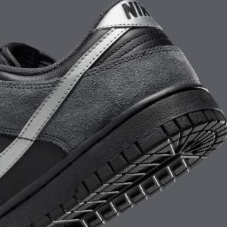 Heel close-up of the Nike Dunk Low covered in a "Black/Anthracite/Metallic Dark Grey" color scheme.