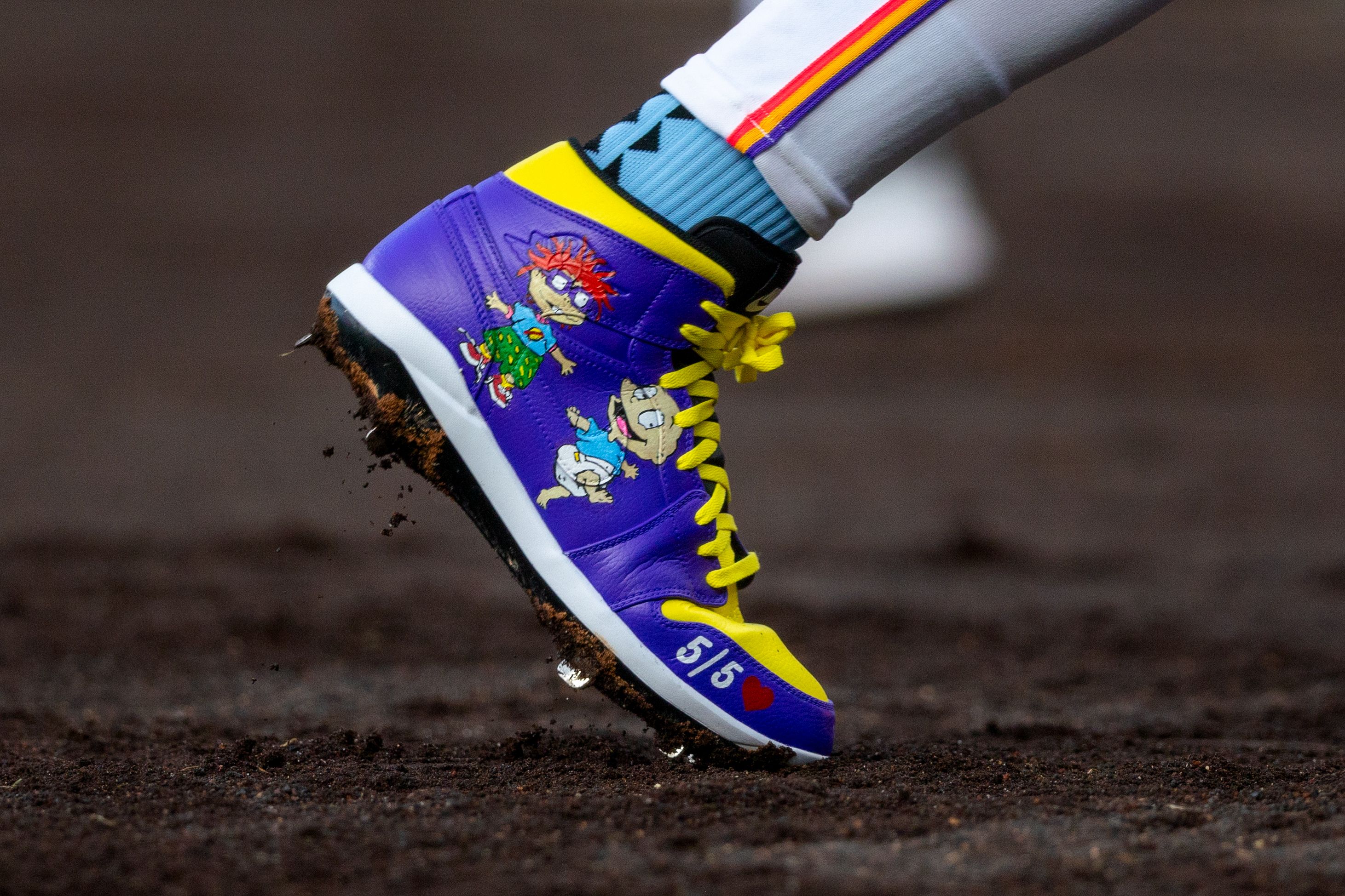 Willi Castro's Rugrats Air Jordan 1 Cleats. Photos via MLB.