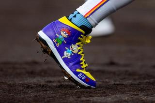 Willi Castro's Rugrats Air Jordan 1 Cleats. Photos via MLB.