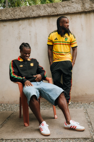 Dexter Lembikisa and Kasey Palmer modeling Jamaica's 2026 FIFA World Cup™ Collection by adidas and The Bob Marley Foundation.