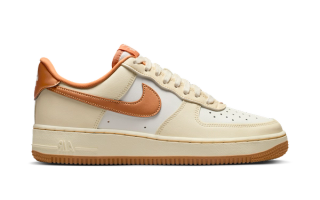 Women's Nike Air Force 1 '07 in a "Coconut Milk/Sail/Celestial Gold/Metallic Copper" color scheme.