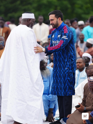 Zohran Kwame Mamdani wearing custom Arsenal 25/26 Away jersey thobe.