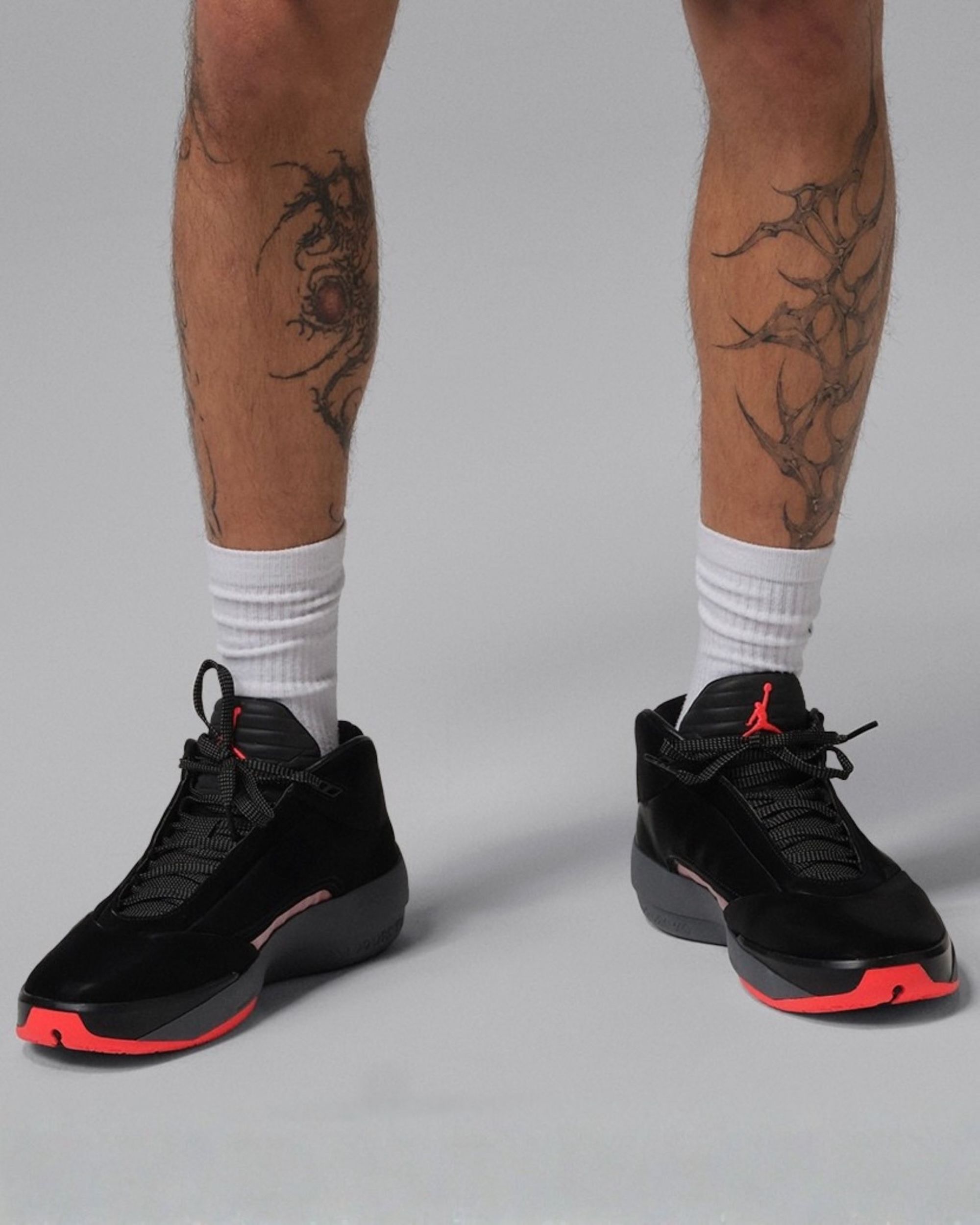 Placeholder for the Air Jordan 40 in a "Black/Infrared 23/Dark Grey" color scheme inspired by the original Air Jordan 6 from 1991.