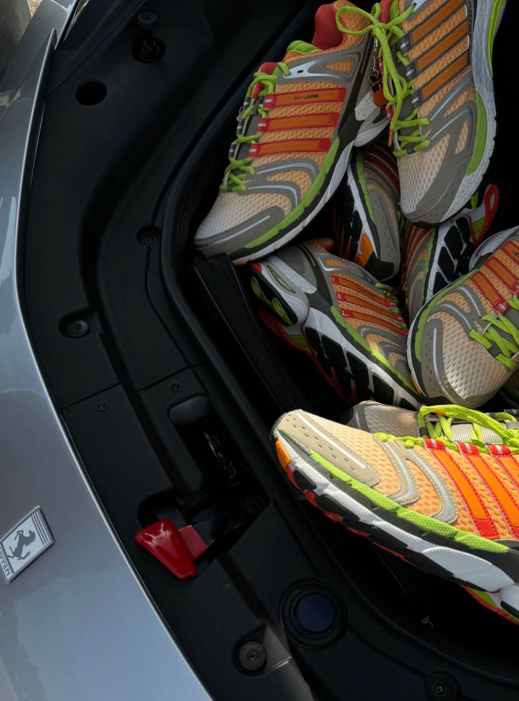 Larry June's orange-clad adidas Adistar Control 5 collaboration.