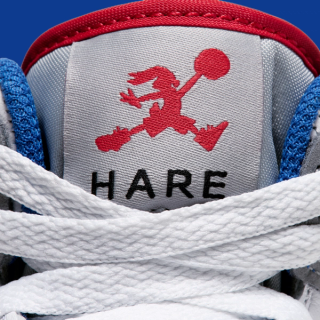 Big Kids's Space Jam x Air Jordan 1 Mid "Hare" (SKU: IZ4720-001). Photo via Nike.
