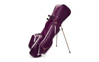 Jordan Fadeaway Luxe Golf Bag in a "Bordeaux/Sail/Metallic Gold" color scheme.