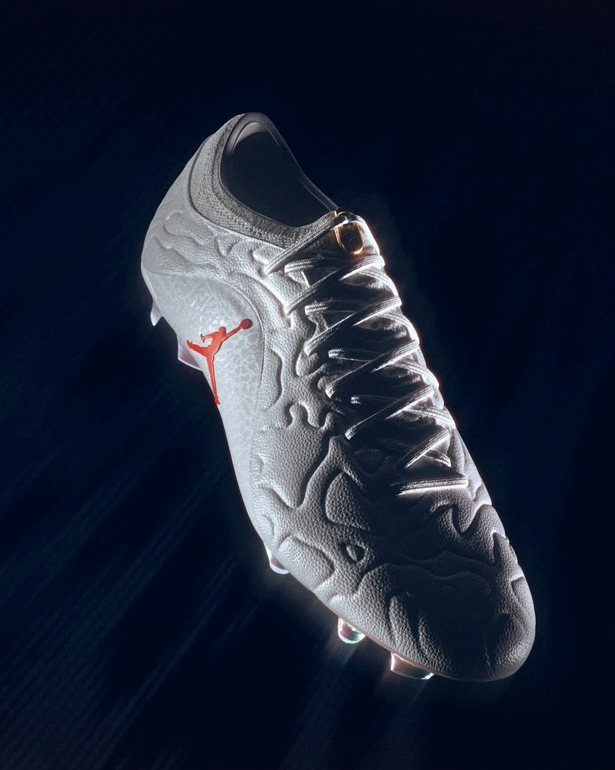 Jordan Brand x Nike Tiempo Maestro Elite FG "Sail/Infrared 23" Boots. Photos by Jordan Brand via 11teamsports.com.