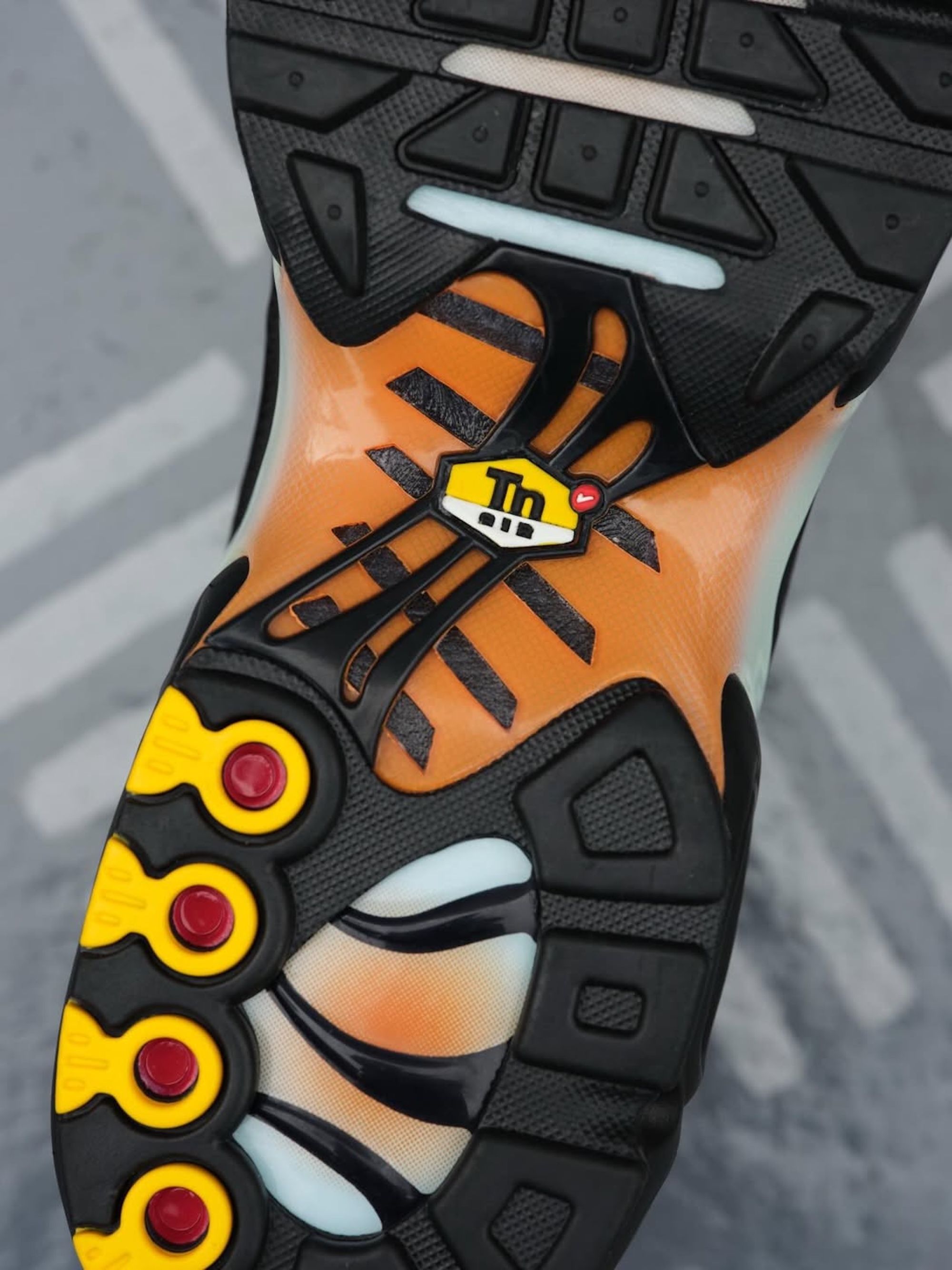 Men's Nike Air Max Plus (SKU: IQ0168-900). Photo via atmos.