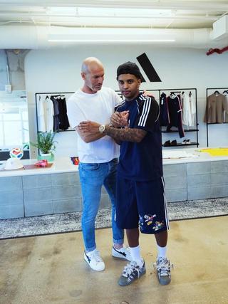Rodrygo wearing Brain Dead x Disney x adidas Collection. Photo via @leobenhossi on Instagram.