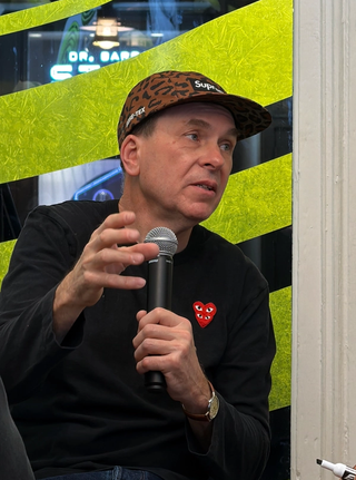 Steven Smith speaking about the Crocs Ripple at the Crocs SoHo store in New York City.