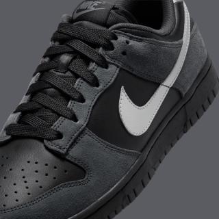 Close-up of the Nike Dunk Low covered in a "Black/Anthracite/Metallic Dark Grey" color scheme.