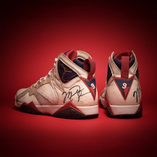 Heel shot of an original Air Jordan 7 "Olympic" pair of sneakers worn & signed by Michael Jordan. Photo via Sotheby's.