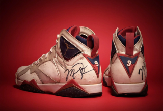 Heel shot of an original Air Jordan 7 "Olympic" pair of sneakers worn & signed by Michael Jordan. Photo via Sotheby's.