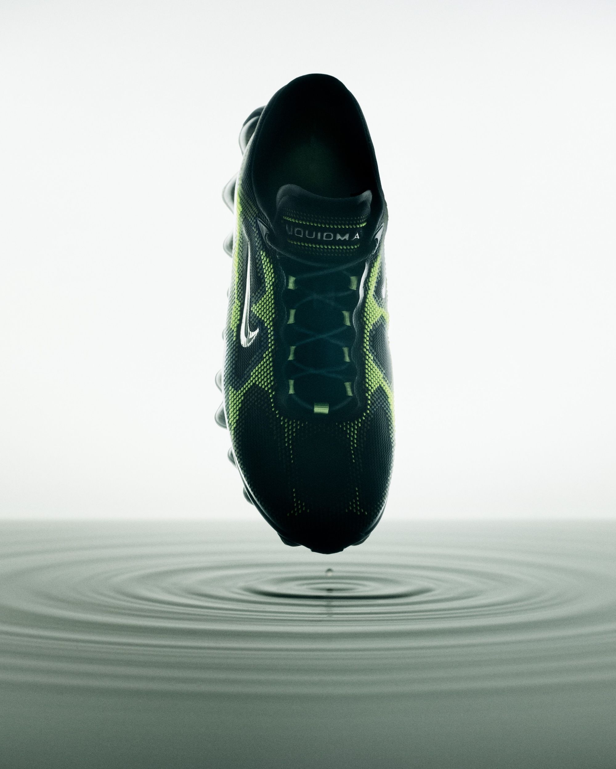 Nike Air Liquid Max Radiant Green IQ7634-001 — product shot showing three-layer textured upper and translucent outsole