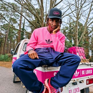 Twitch partner Raud wearing SNIPES' pink-covered "Be Loved" adidas AdiStar Control 5 collaboration.