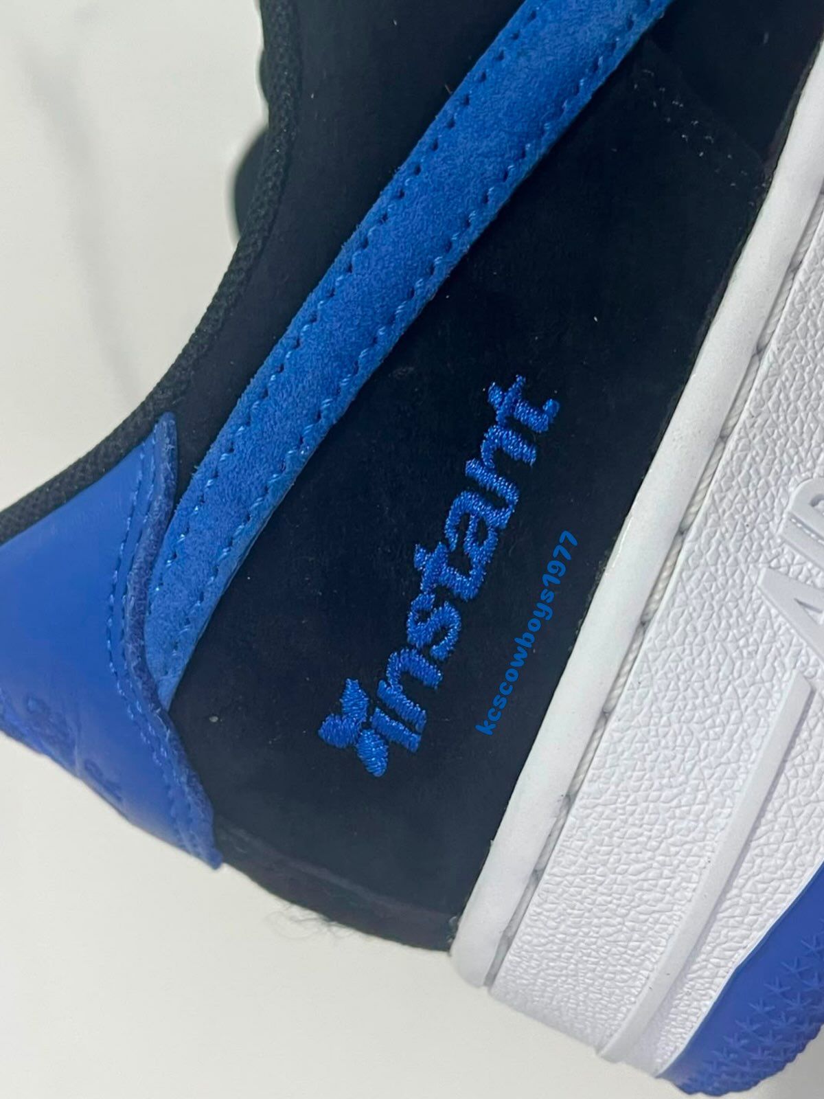 Close-up heel shot of the unreleased Instant Skateboards x Nike SB Air Force 1 "Black/Game Royal/White" collaboration. Photo via Instagram user @kcscowboys1977.