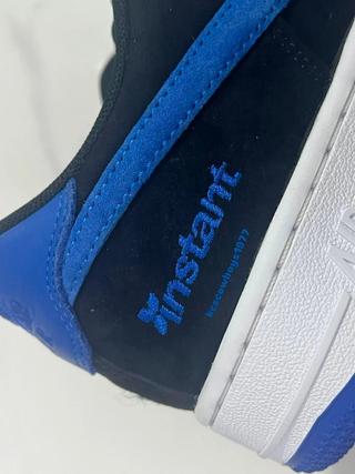 Close-up heel shot of the unreleased Instant Skateboards x Nike SB Air Force 1 "Black/Game Royal/White" collaboration. Photo via Instagram user @kcscowboys1977.