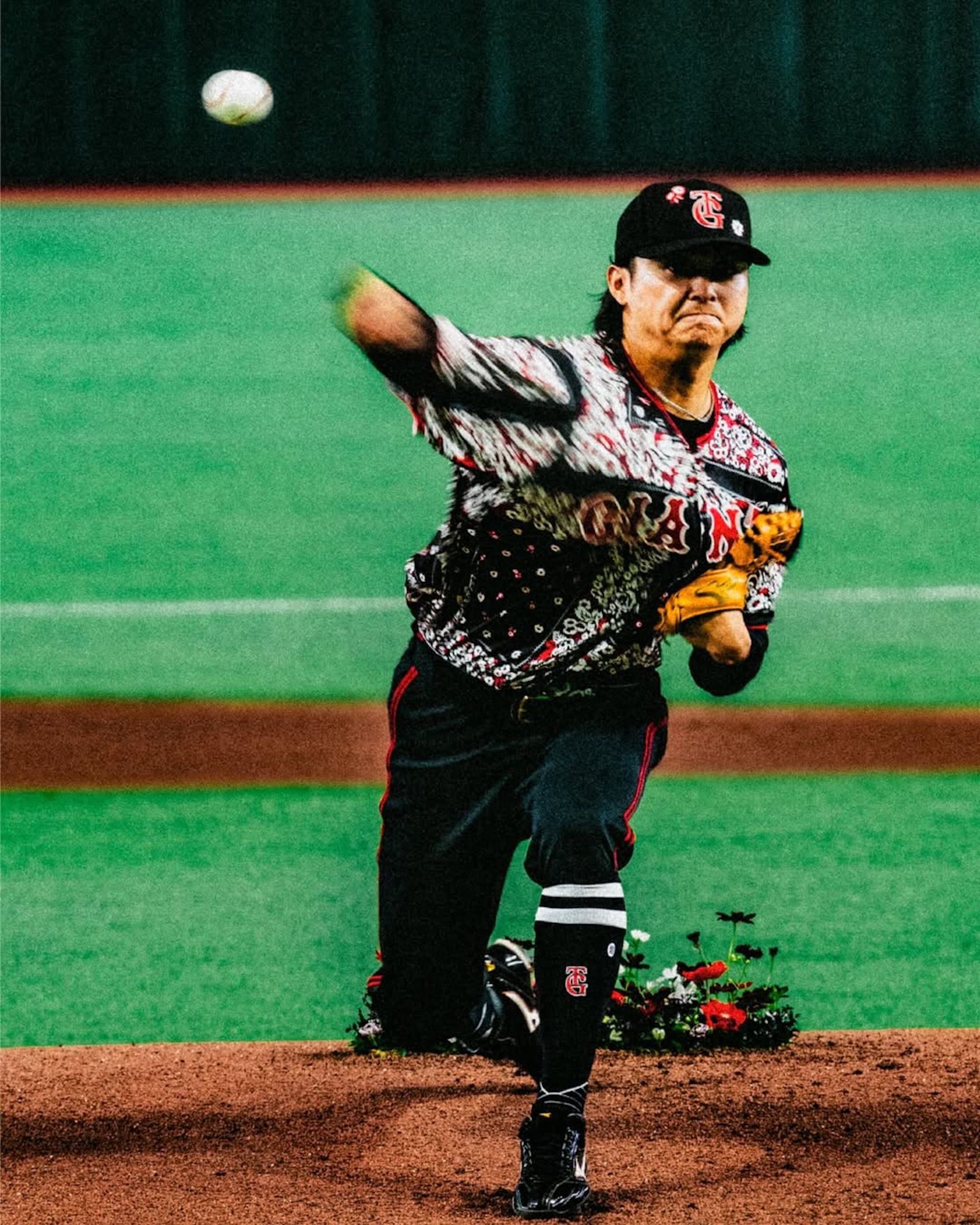 Campaign photo for Jordan Brand's special-edition baseball uniform for Japan's Yomiuri Giants, featuring Nomarhythm Textile material.