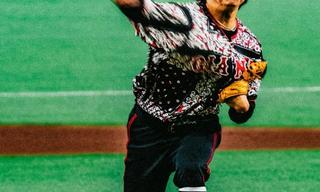 Campaign photo for Jordan Brand's special-edition baseball uniform for Japan's Yomiuri Giants, featuring Nomarhythm Textile material.