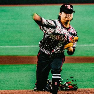 Campaign photo for Jordan Brand's special-edition baseball uniform for Japan's Yomiuri Giants, featuring Nomarhythm Textile material.