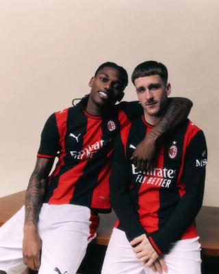 Rafael Leão & Alexis Saelemaekers for AC Milan 26/27 Home Kit. Photo via AC Milan.