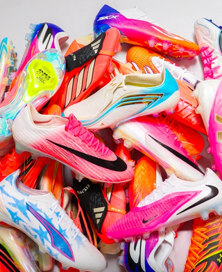 Group photo of over a dozen 2026 World Cup™ boots from adidas ("Road to Glory"), Nike ("Breakout"), PUMA ("Showtime") & others. Photo by BOOTSCULTURE®.