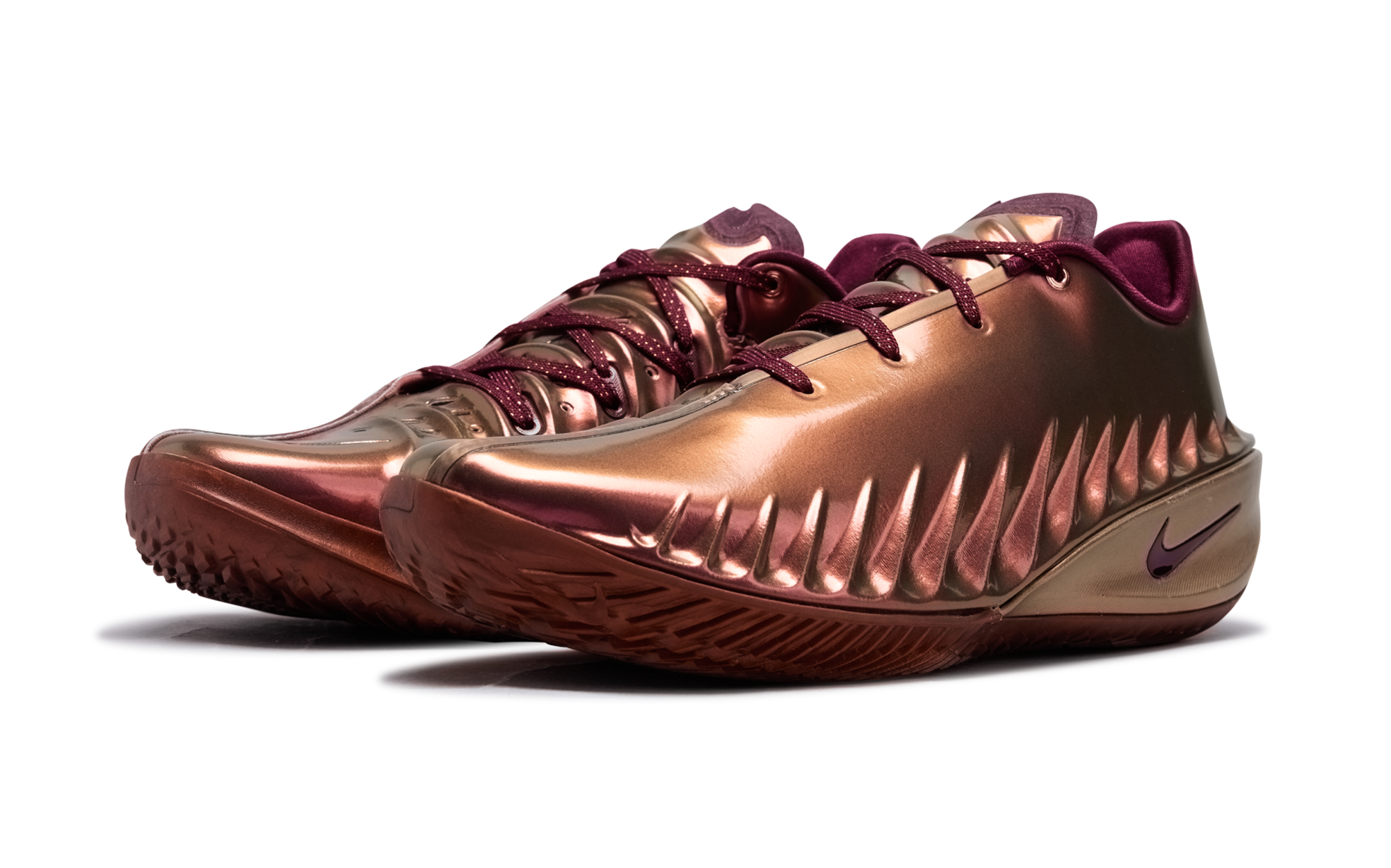 Dylan Harper's Nike G.T. Cut 4 basketball shoe in a "Metallic Rose Gold/Deep Maroon" color scheme.