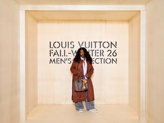 SZA wearing custom Vans by Rachel Goatley while attending Louis Vuitton's Fall/Winter 2026 show in Paris.