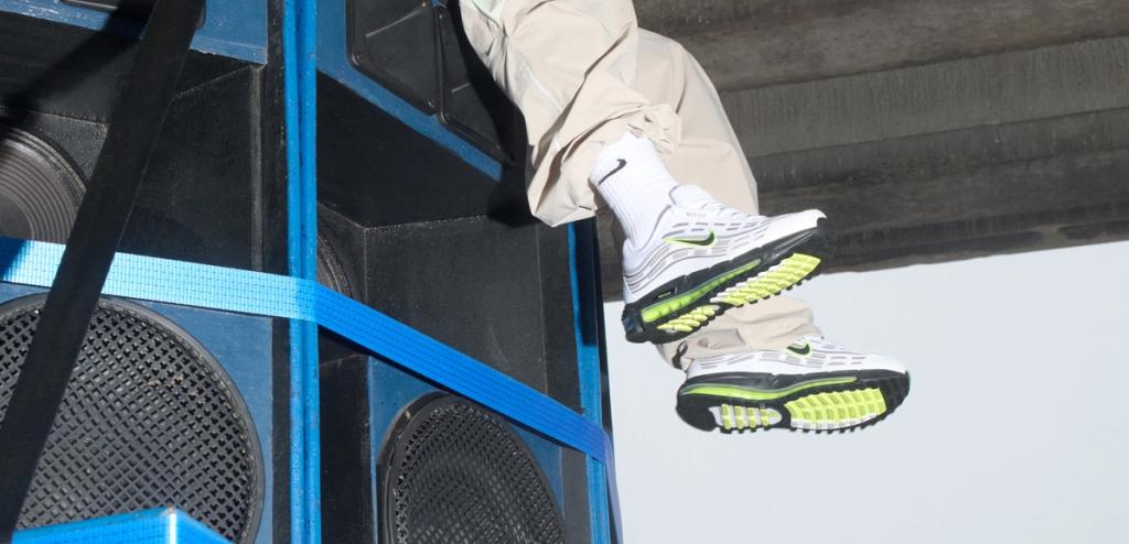 Nike Air Max TL 2.5 in neon colorway, showing fluorescent accents across the tubular silhouette and cushioned midsole