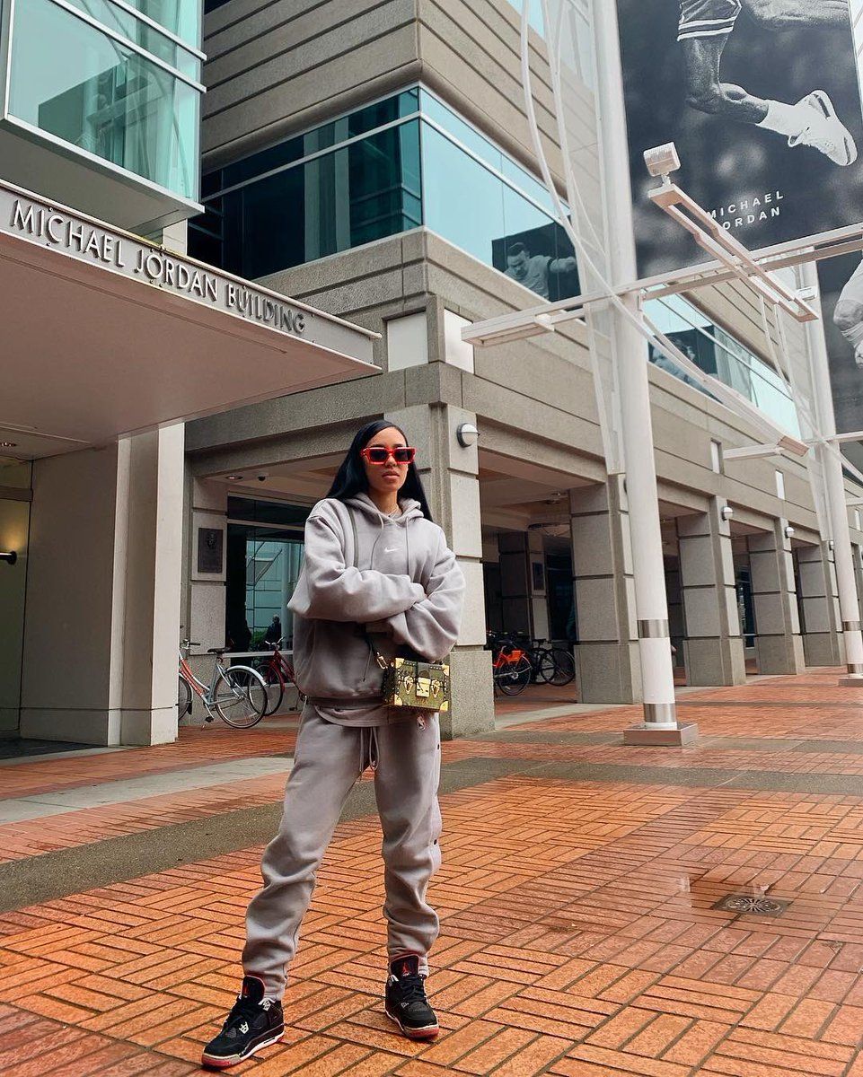 Aleali May // Air Jordan 4 Black Cement