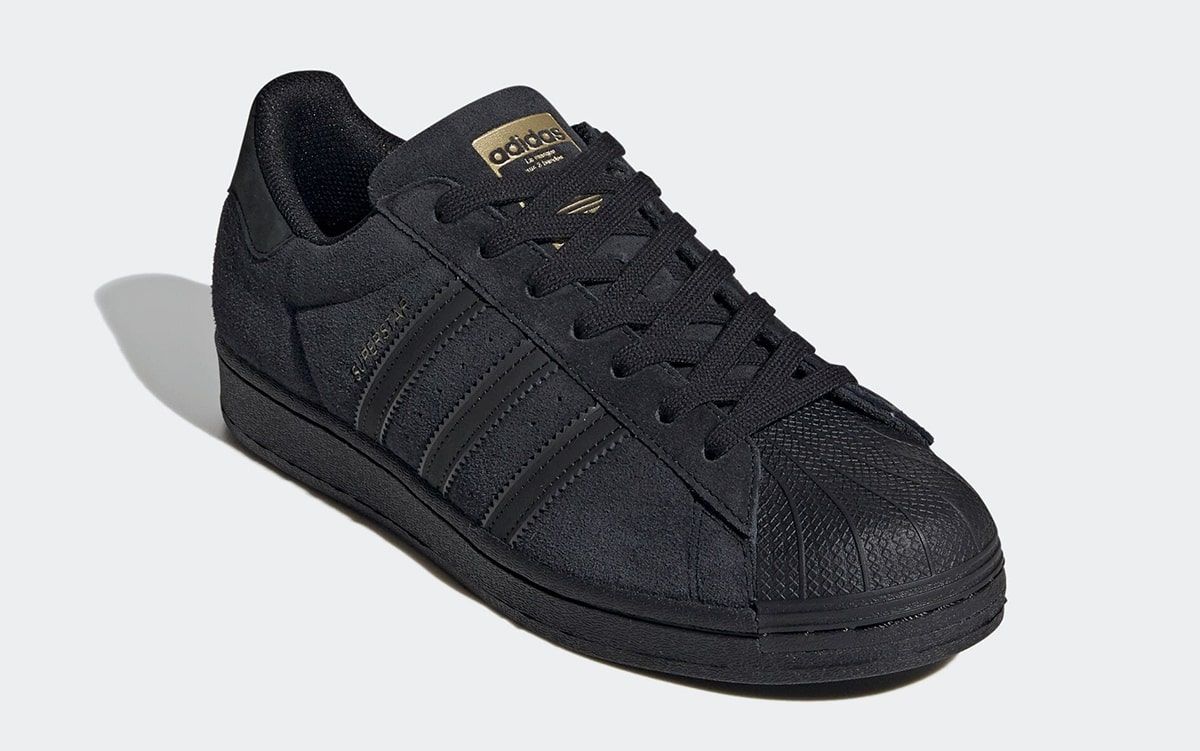 Adidas suede black superstars sale