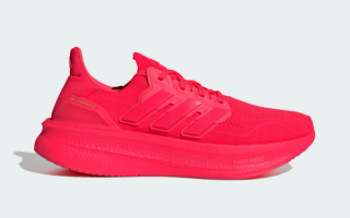Adidas Running's UltraBOOST 5 in a "Lucid Red/Matte Gold" color scheme.