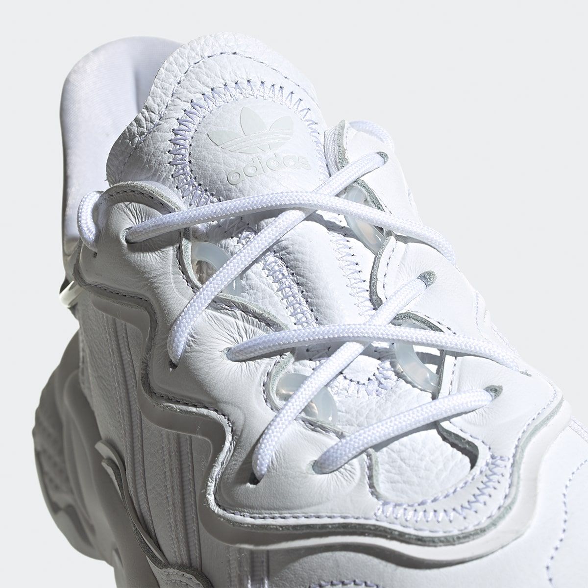 Triple on sale white ozweego