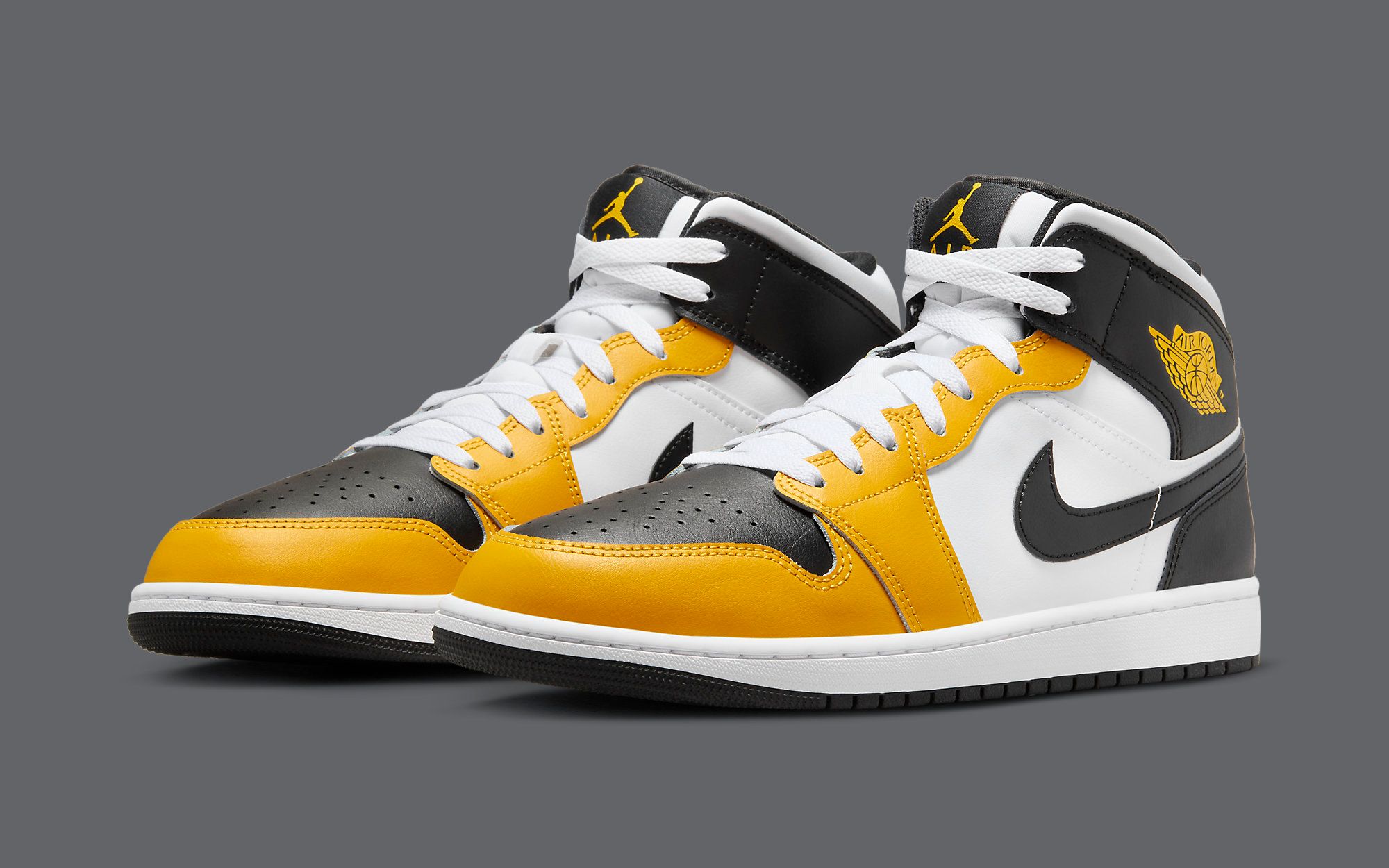 Jordan aj1 mid on sale yellow and black