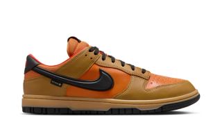 Nike's GORE-TEX-protected Dunk Low in a "Wheat/Ceramic/Picante Red/Black" color scheme.