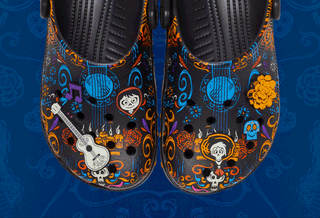 Glow-in-the-dark Disney & Pixar's Coco x Crocs Classic Clog collaboration for Día de Muertos 2026.