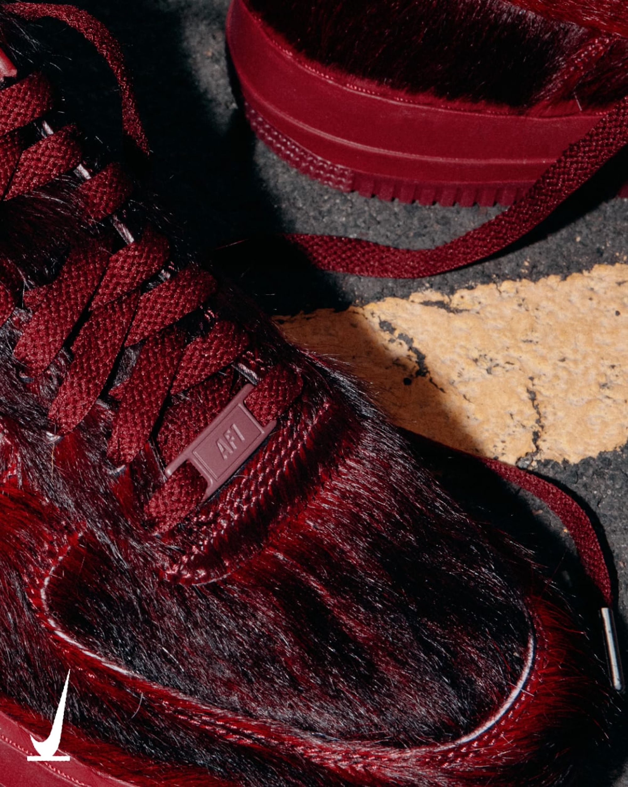 Nike Air Force 1 "Team Red" (Pony Hair; SKU: IR1940-600). Photo via Nike.