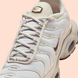 Close-up of Nike's Air Max Plus sneaker in a "Light Orewood Brown" color scheme.