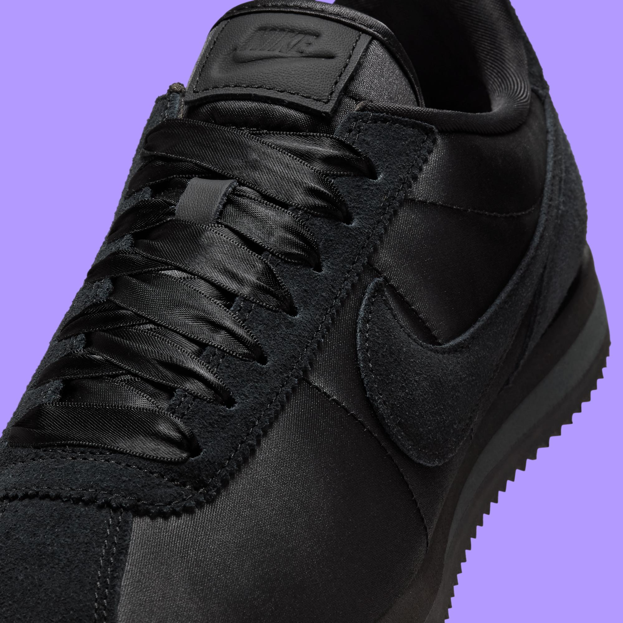 The Womens Nike Cortez Textile Appears In Triple Black